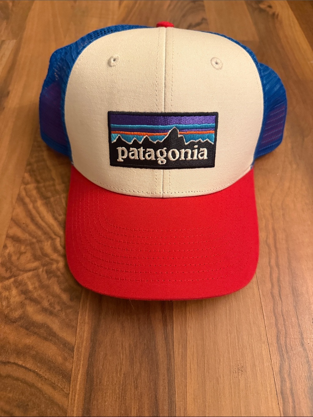 Patagonia Cream Front Red Bill Blue Mesh Trucker Hat with Logo Patch